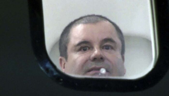 el-chapo-looks-out-window-of-airplane-dea-photo-963cef-1024